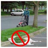 Gardner mowing and bagging the clippings.