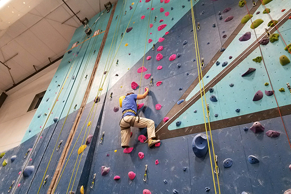 child rock climbing