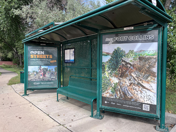 bus stop kiosk with artwork and ad