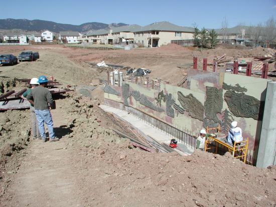 Installation of formliner to create the concrete mold.