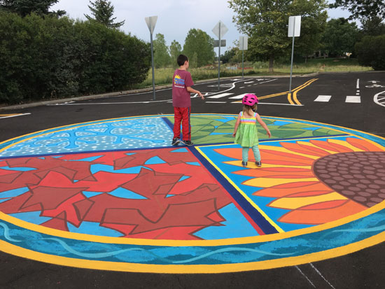 Children enjoying mural