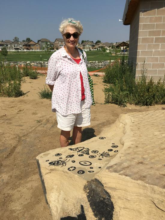 Artist Carolyn Braaksma with sandblasted seating