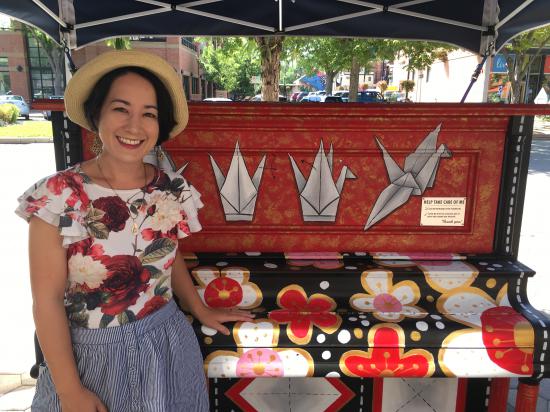 Amy Heyse and her piano mural