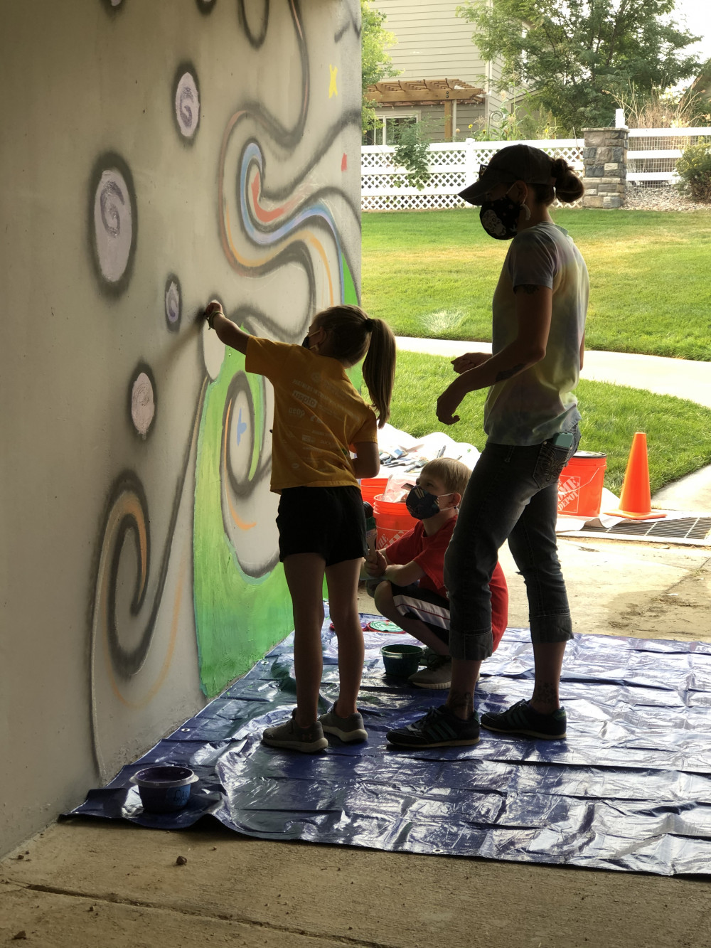 Community members painting