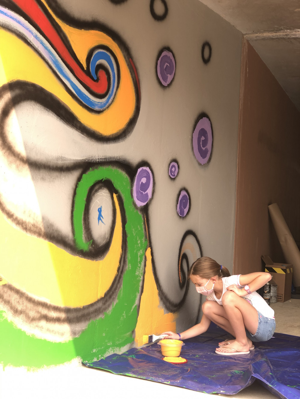 Community members painting