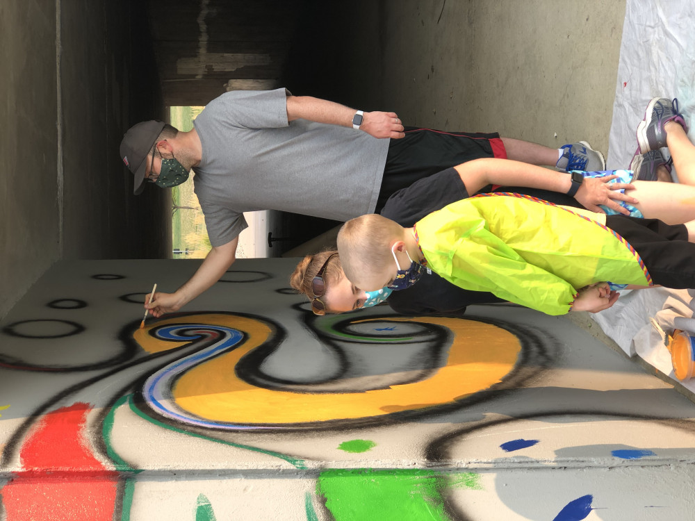 Community members painting