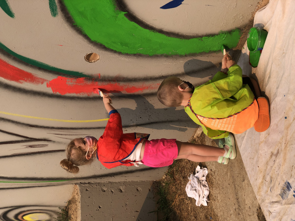 Community members painting