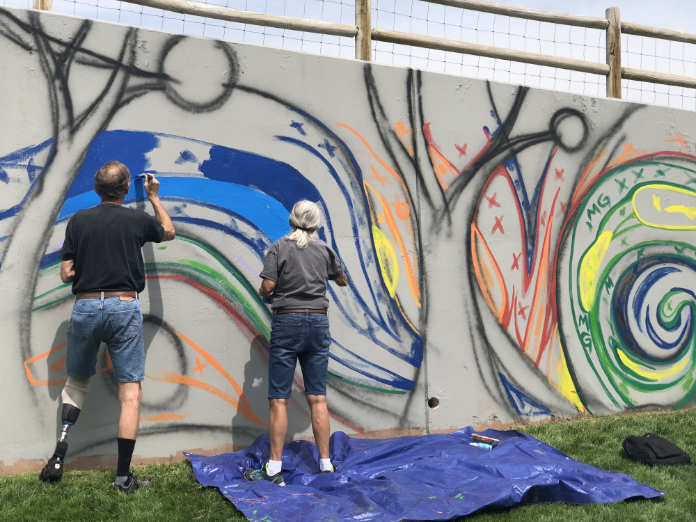 Community members painting on August 28