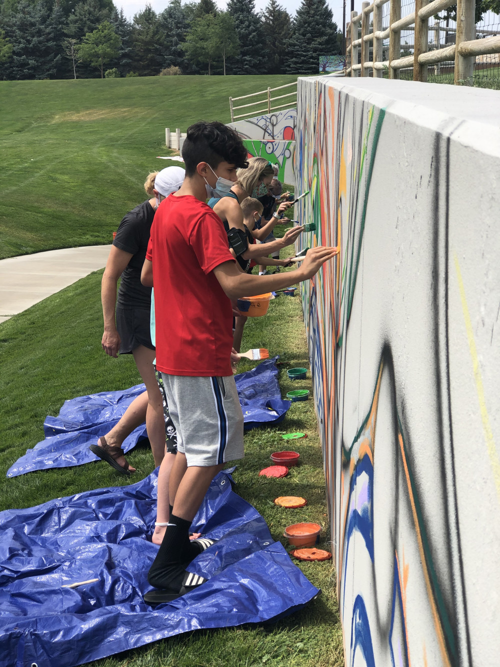 Community members painting