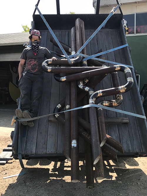 Artist Todd Kundla and sculpture in progress