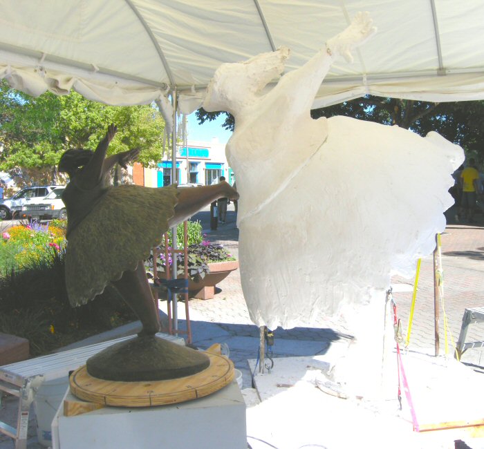 The completed clay sculpture before being cast in bronze and model.