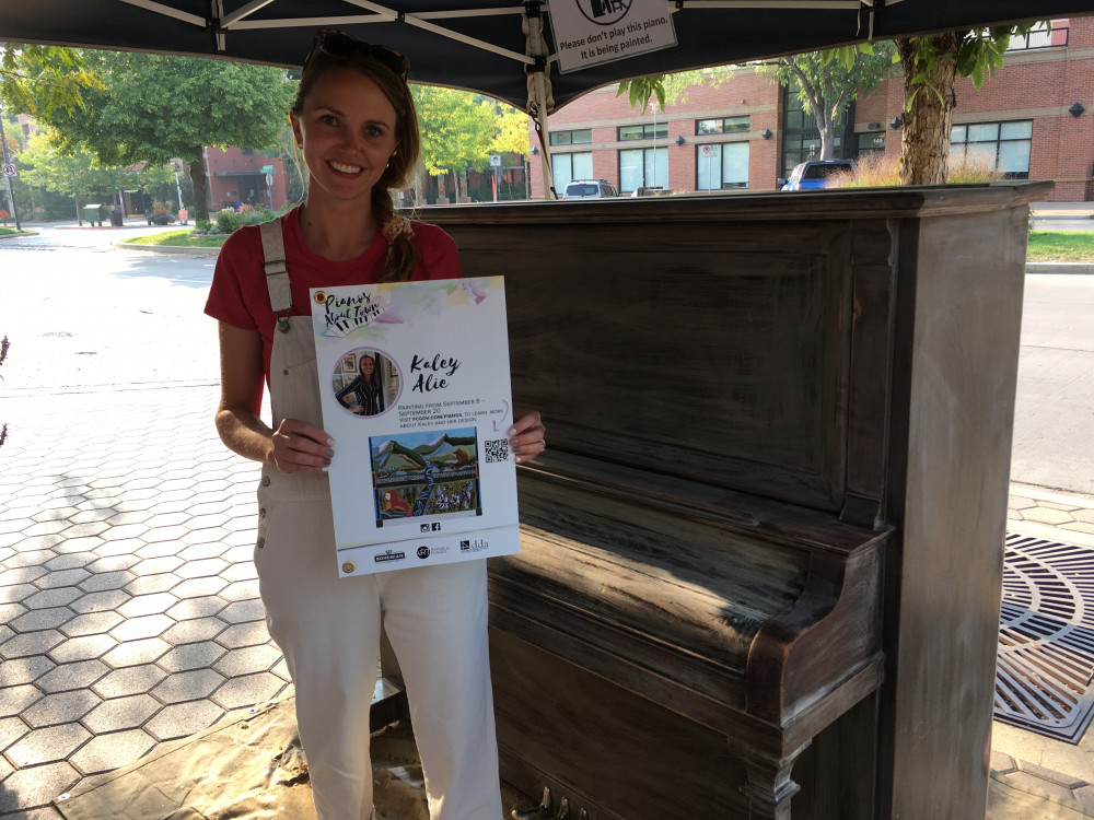 Kaley and her design before painting