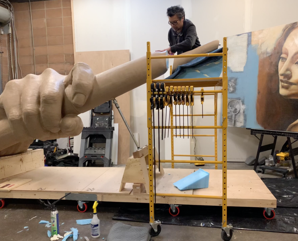 Frank creating the clay sculpture.