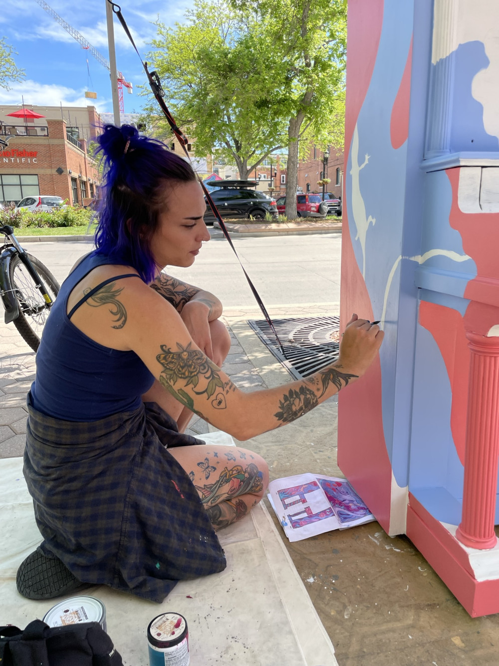 Makari Roehrkasse painting her mural