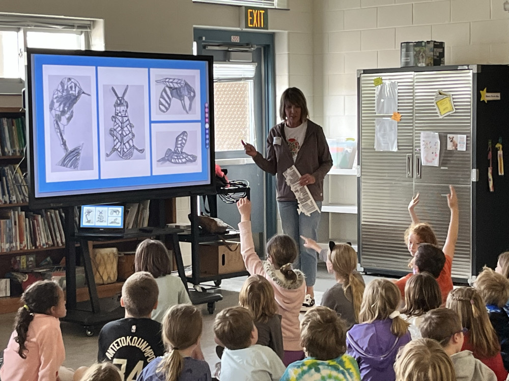 Lisa shares the project details with students
