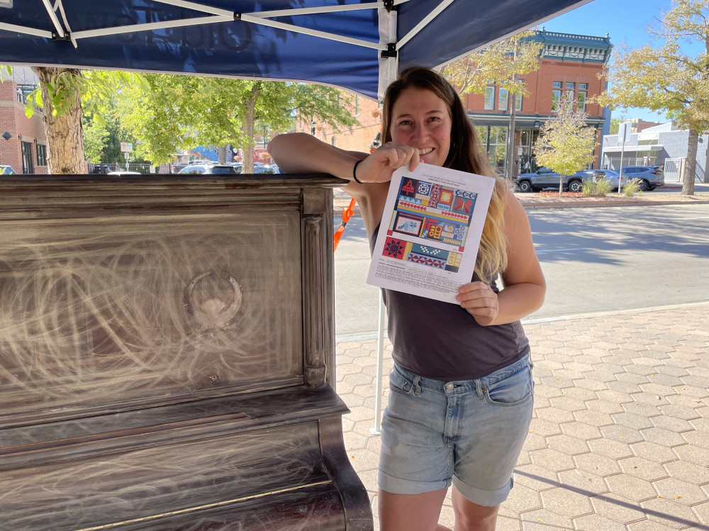 Chelsea and her piano before painting