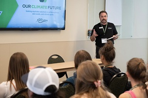 City employee teaching a class about Our Climate Future.