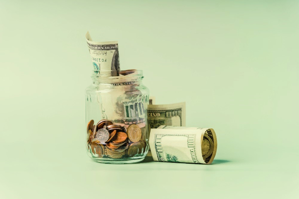Image showing dollar bills and coins.