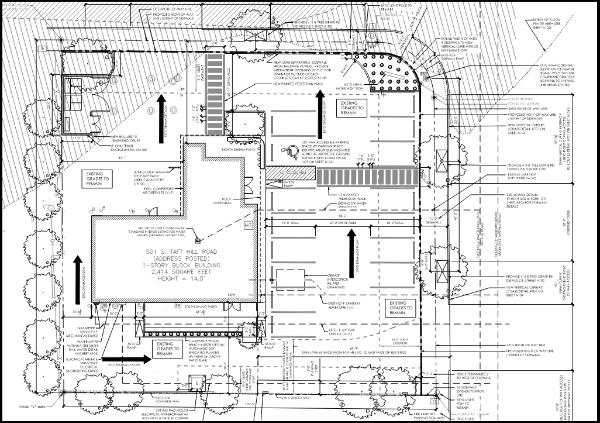 Architectural site plan detailing building layout, parking, landscaping, and access routes for a 2,141 sq. ft. block building