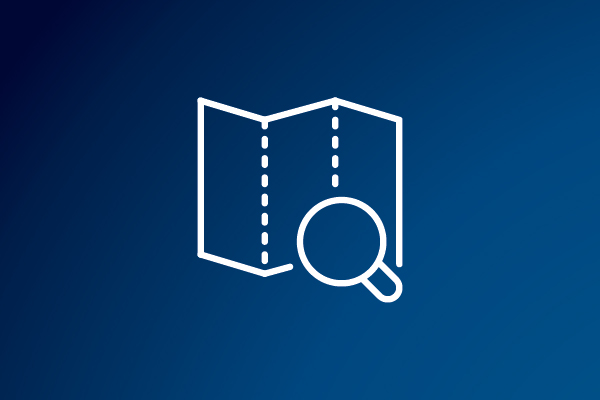 white line drawing of a map and magnifying glass against a blue background