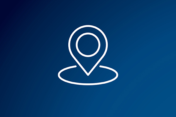 white line drawing of a map pinpoint against a blue background