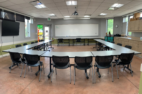 classroom with tables and chairs