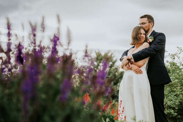 Bride and groom with flowers