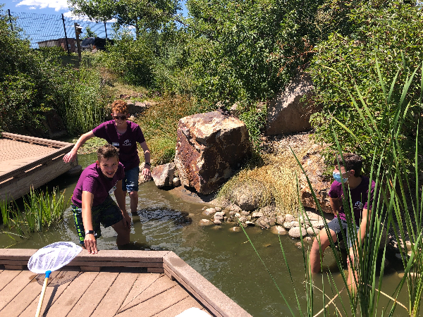 teens playing in the water at The Gardens