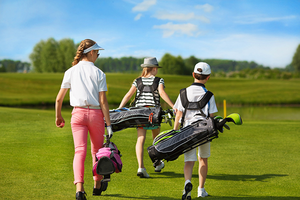 illustration of two junior golfers on golf course