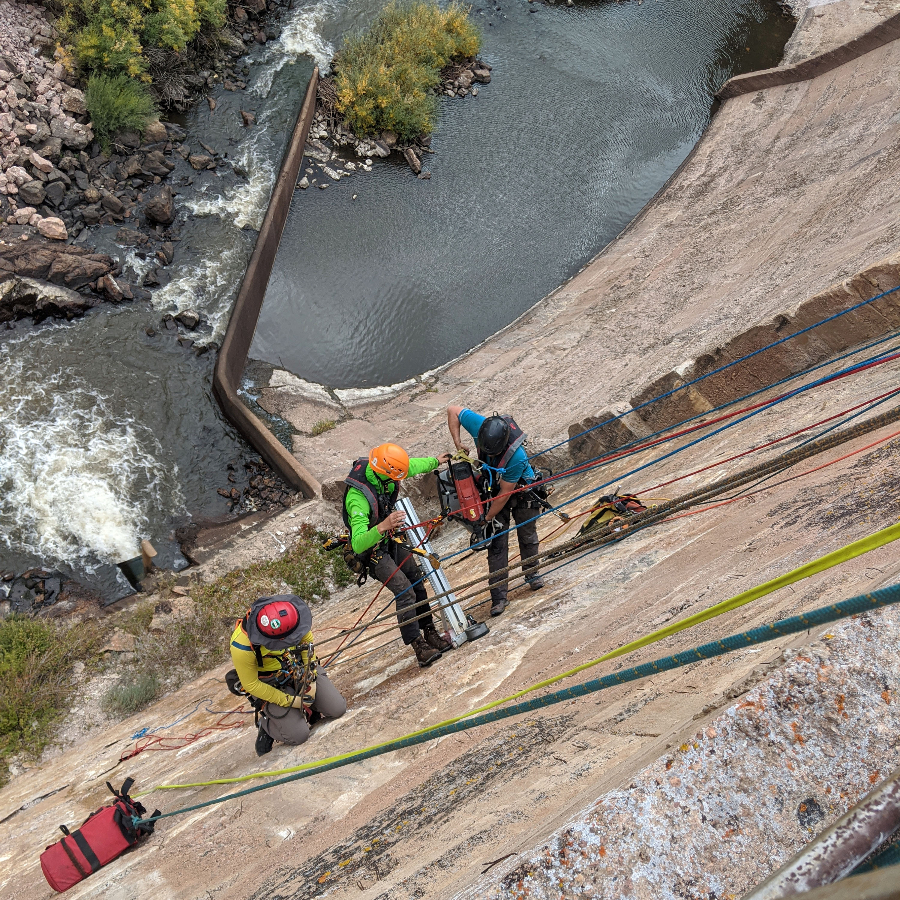 Crews scale Halligan Dam to extract cores