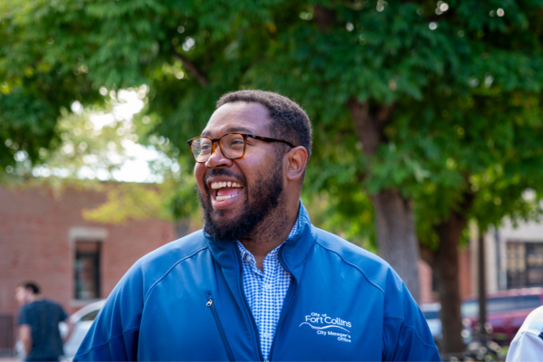 an assistant city manager laughing