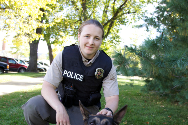 a police officer and their k-9 partner
