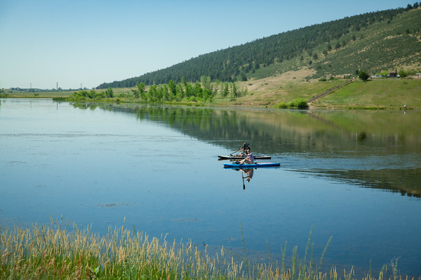 Two kayaks on a reservoir at Pineridge Natural Area