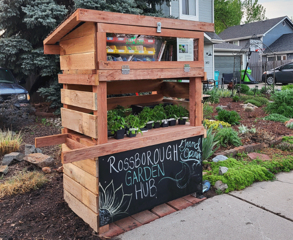A community garden and resource hub for shared supplies in local neighborhood
