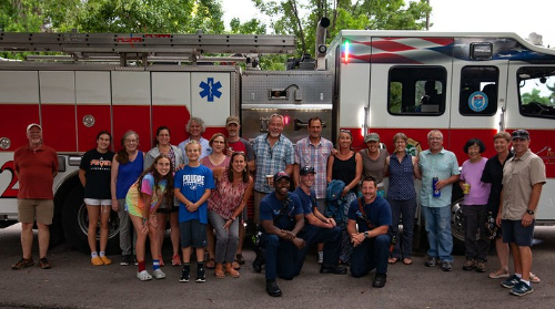 Fire truck and residents at Neighborhood Night Out
