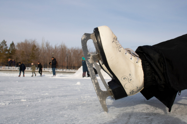 ice skates on frozen lake