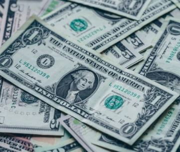 pile of dollar bills