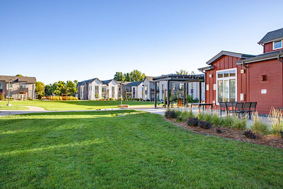 Photo of homes and green grass