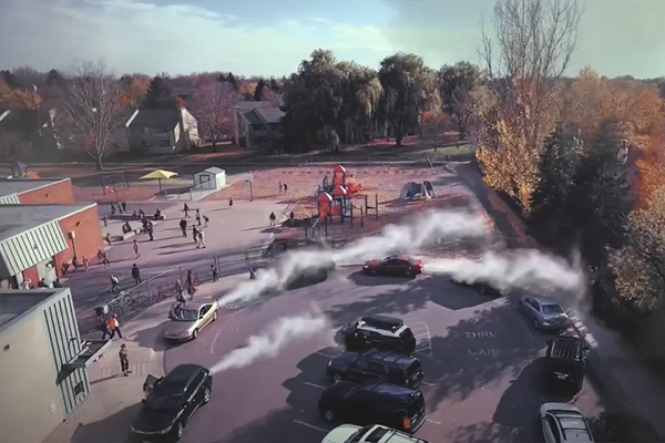 aerial of cars with extreme exhaust