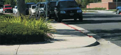 Image of intersection with limited sight for oncoming vehicles