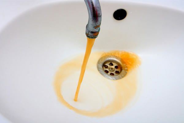 yellow, brown water coming out of faucet