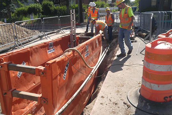 Crews get equipment ready for pipe-bursting.
