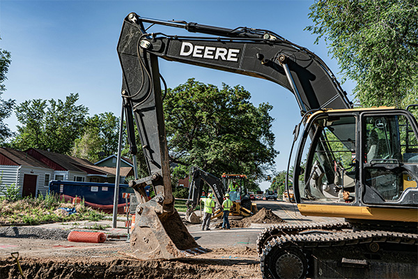 excavator on site at Utilities project