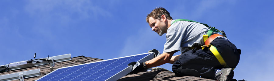 Contractor installing solar