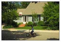 Boy riding bicycle