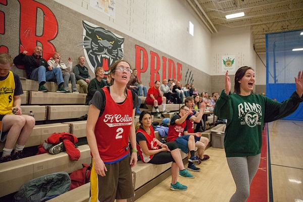 volunteer coach cheers on team